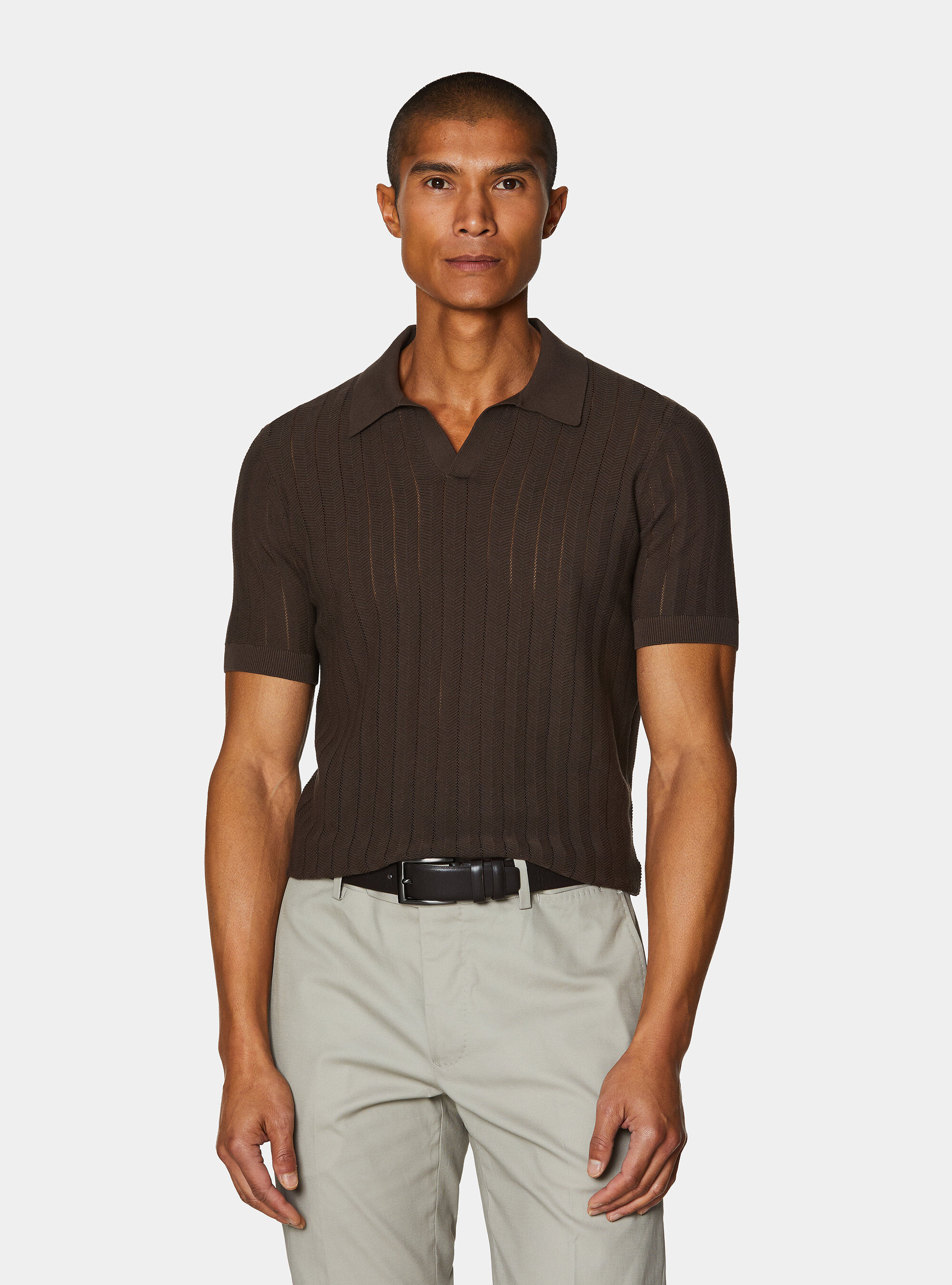 Polo traforata in cotone spigato