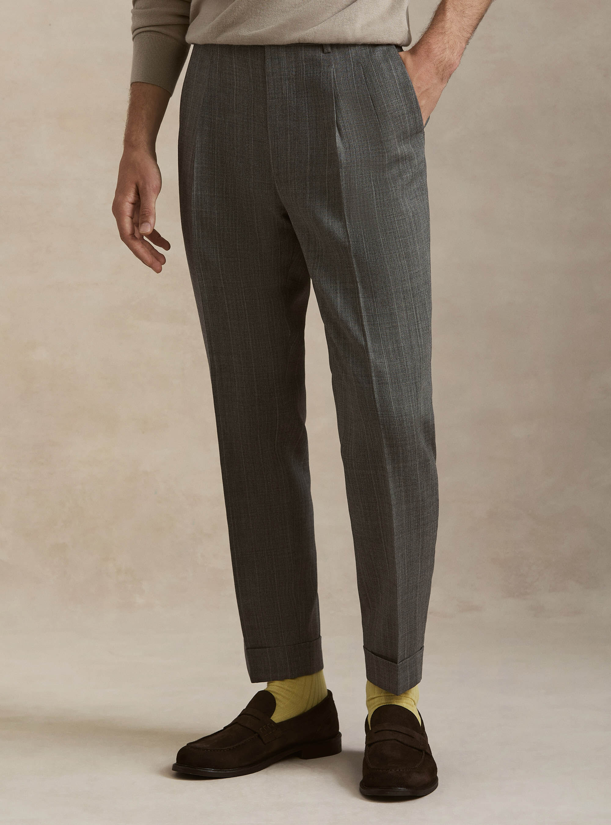 Pantaloni con pince in pura lana spigata