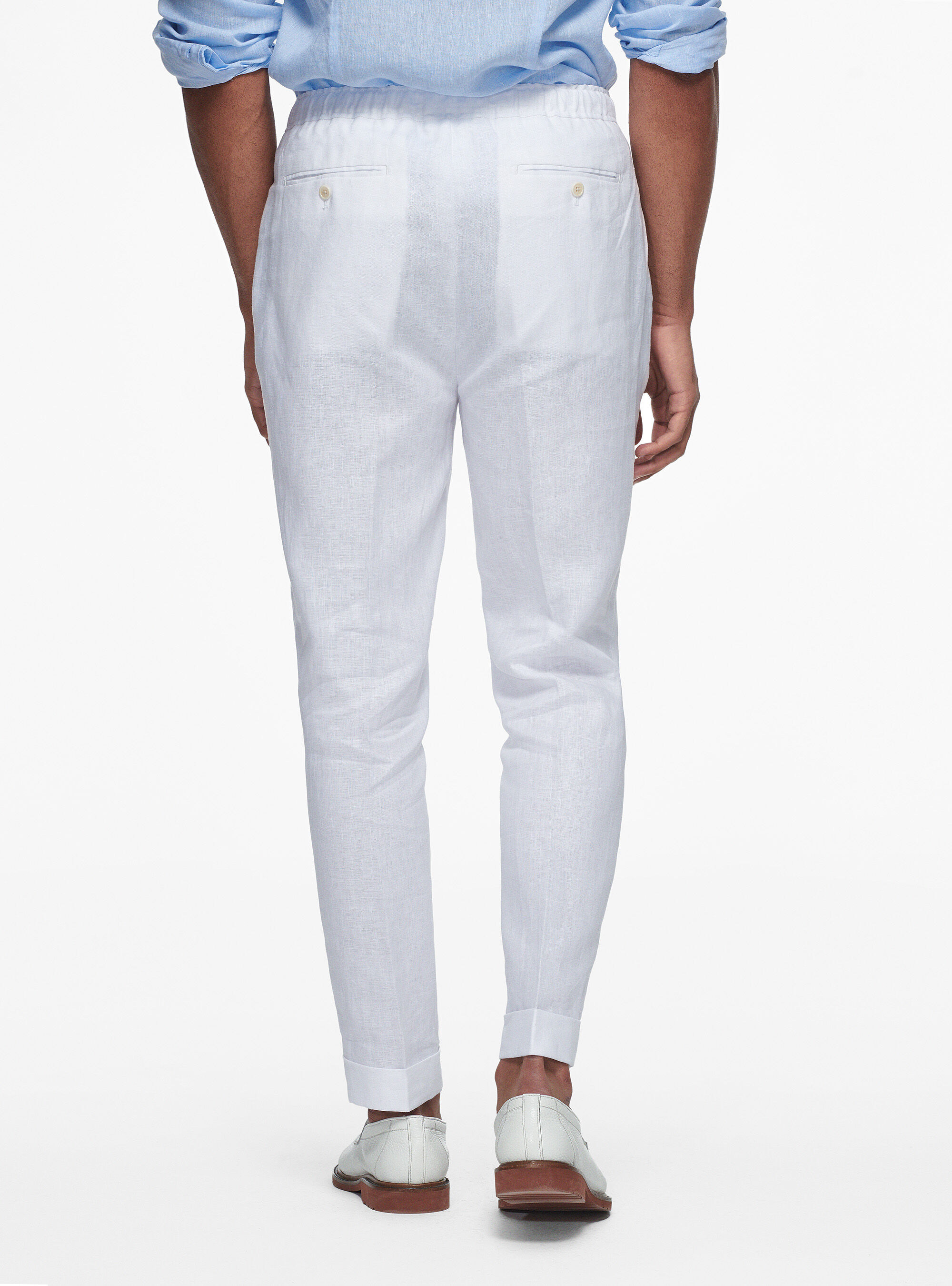 Tapered white linen trousers hotsell
