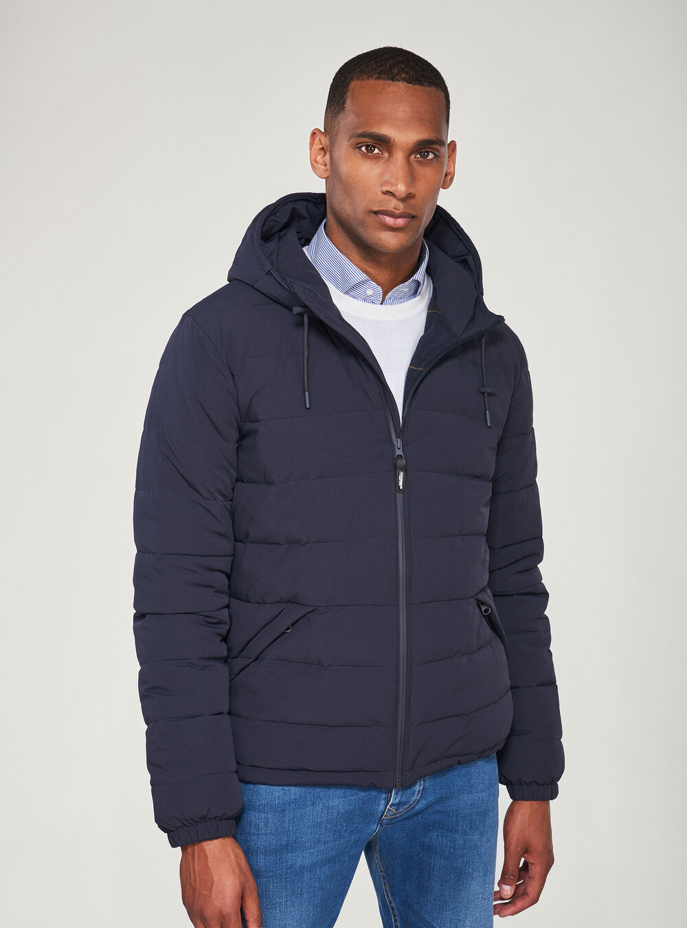 Bomber jacket in technical fabric with hood