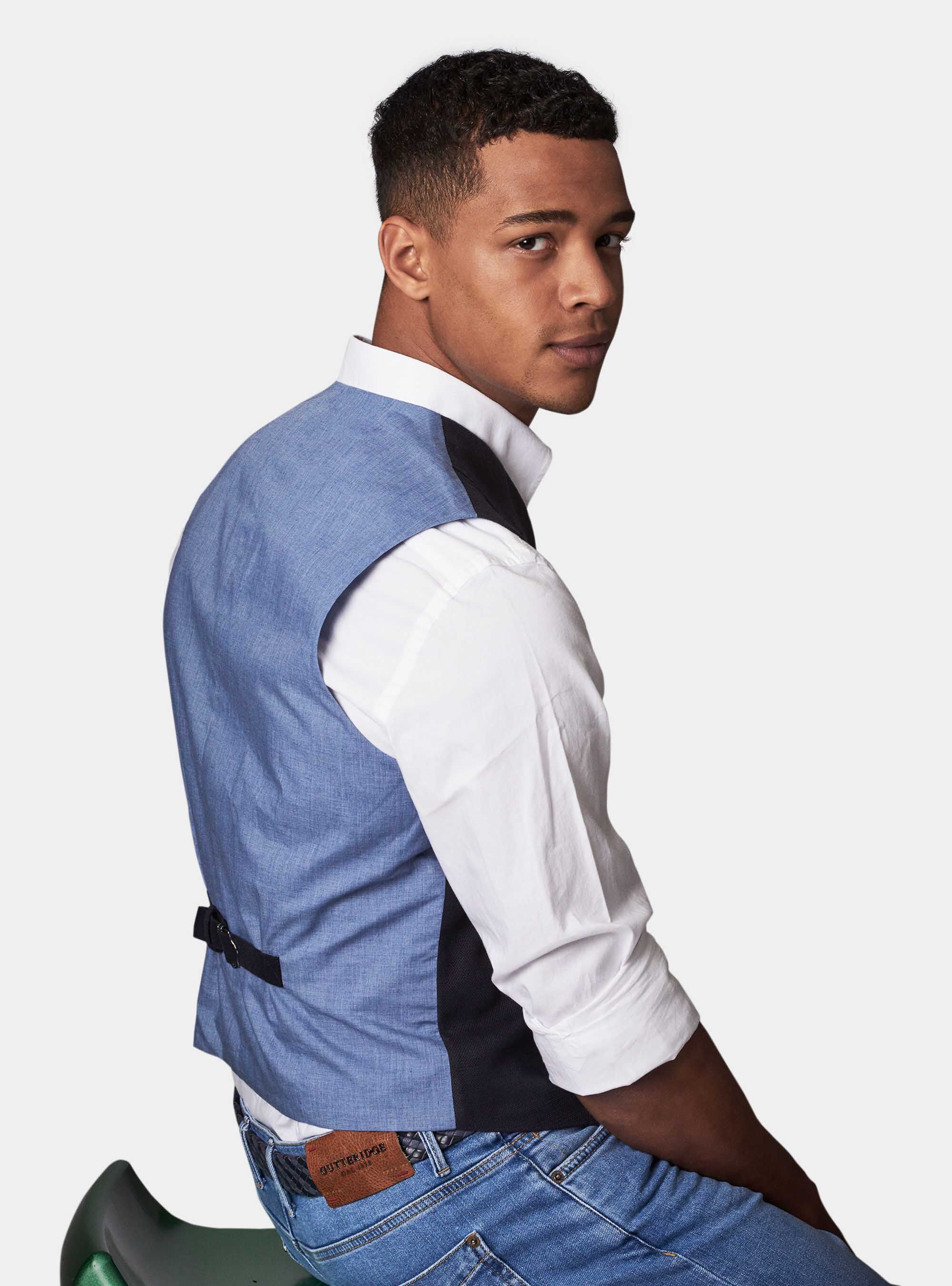 Navy blue vest with jeans sales