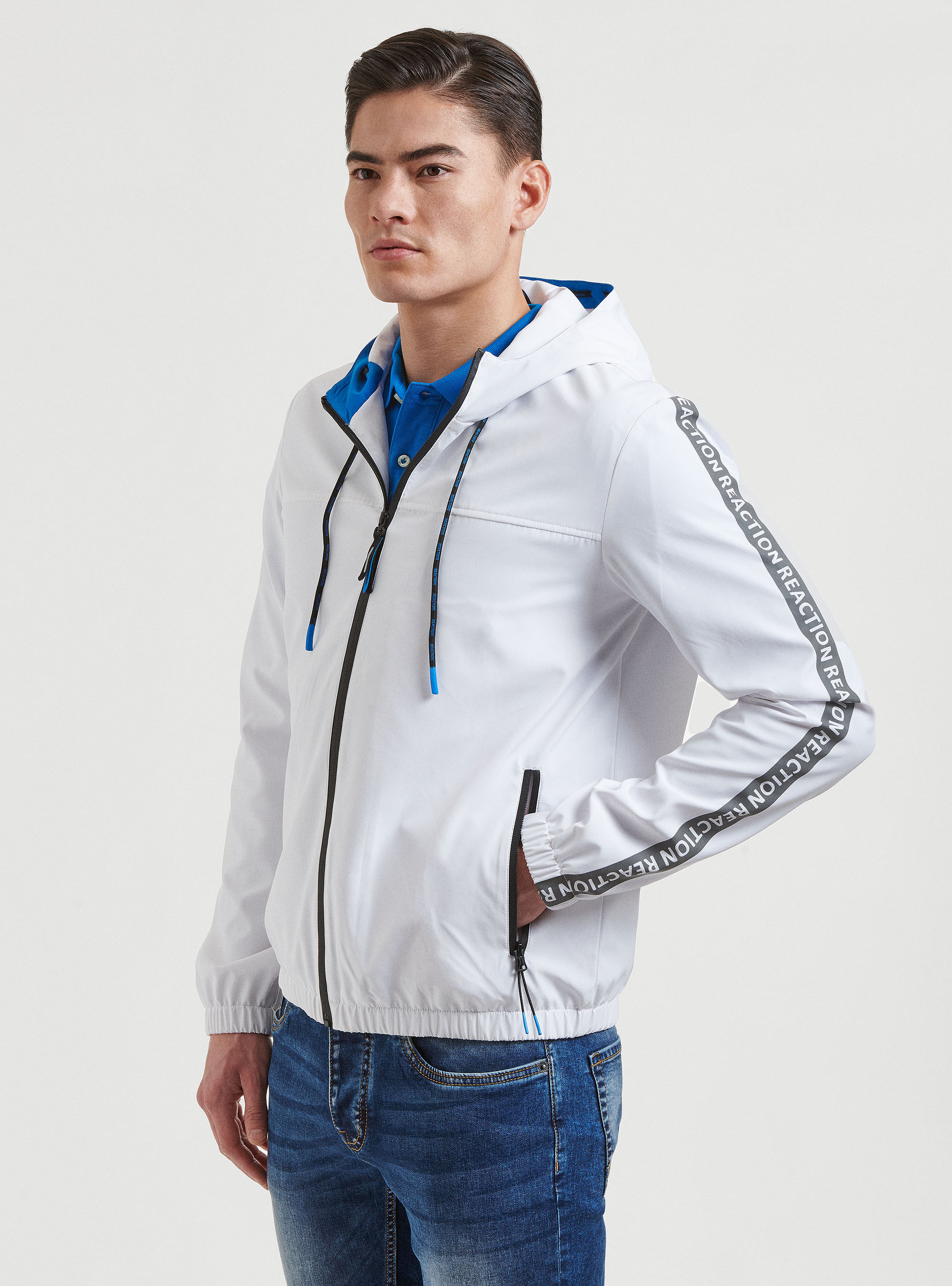 Technical jacket with reflective side bands