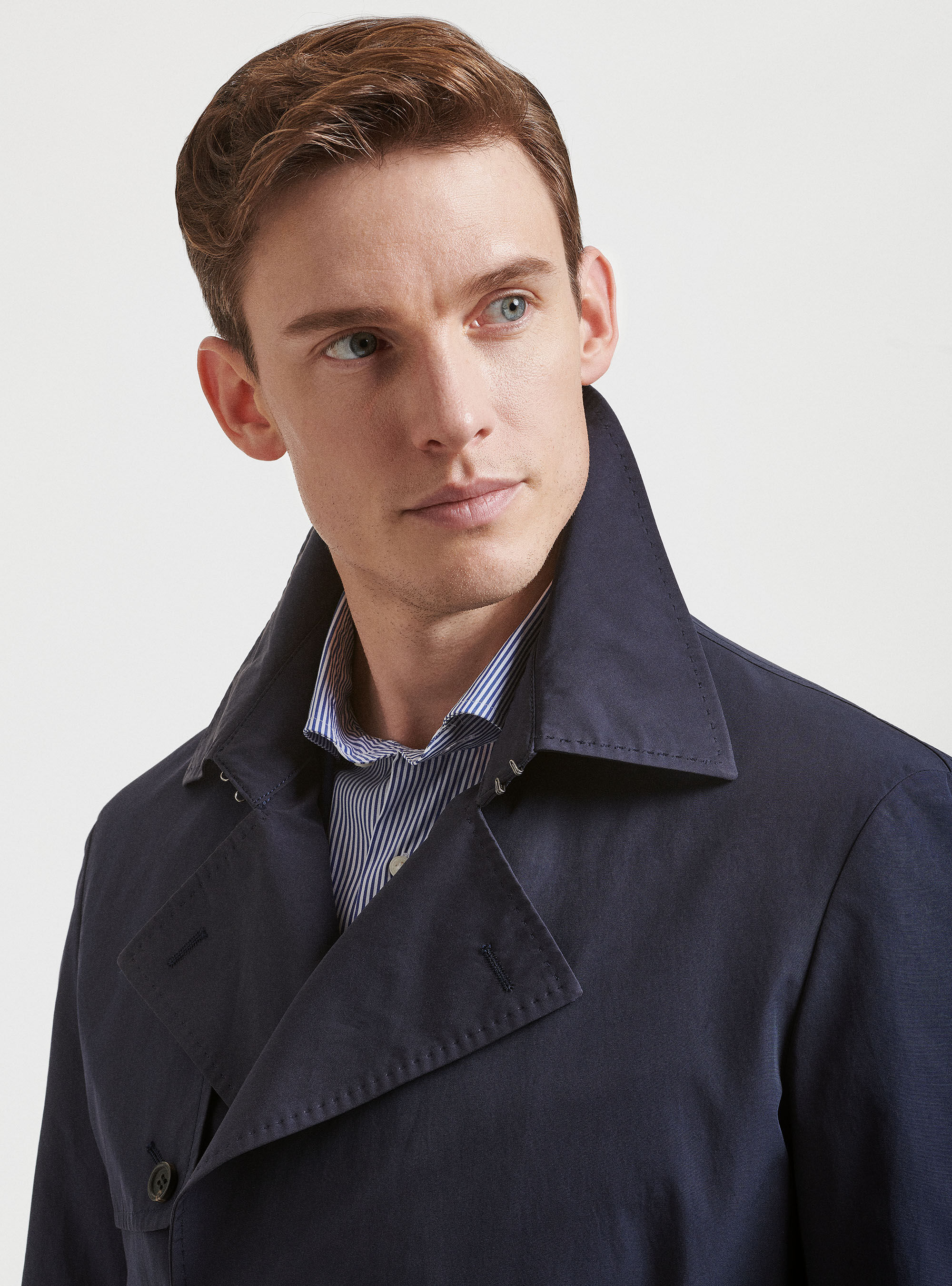 Double breasted raincoat in technical cotton blend twill