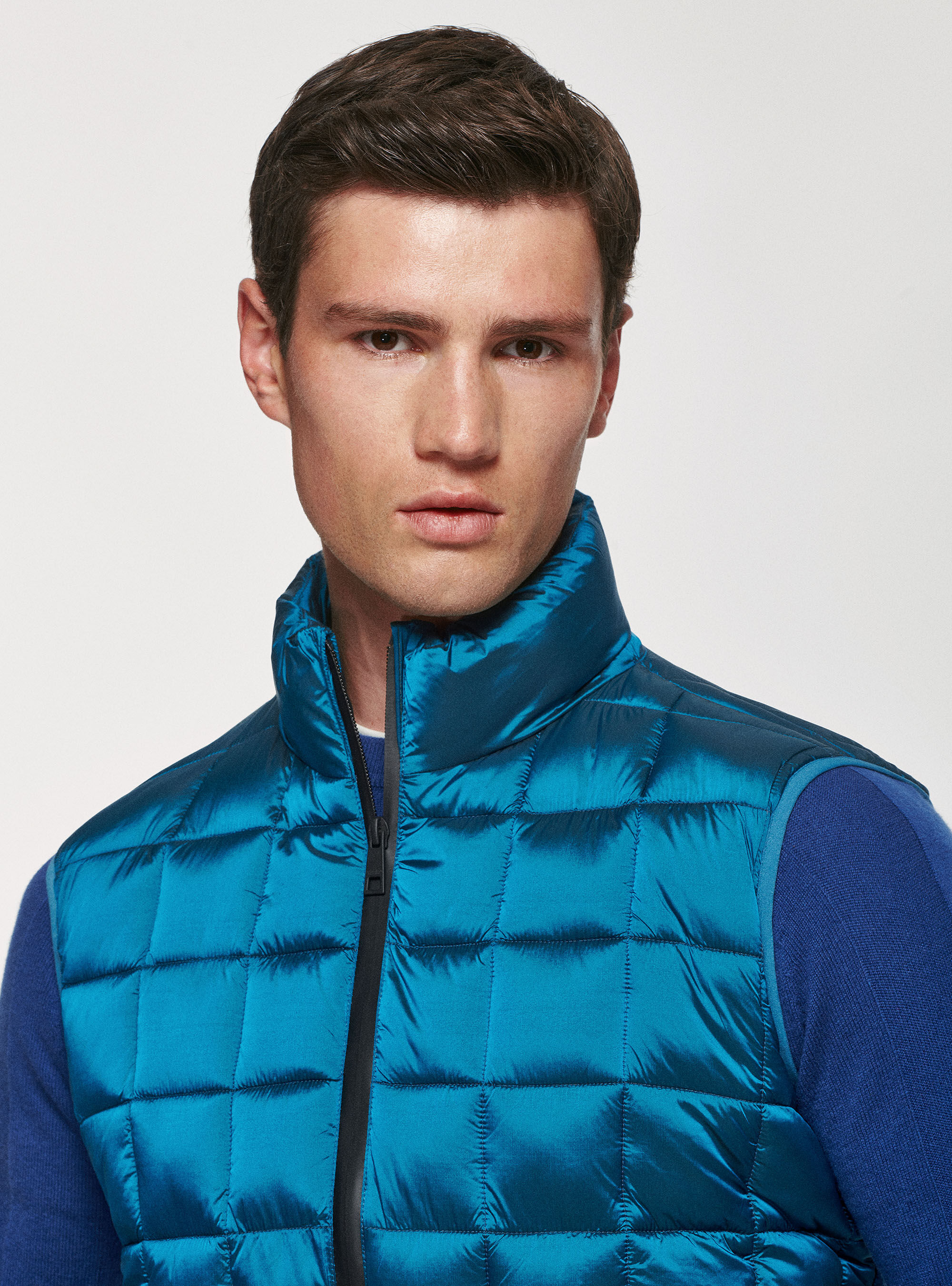 Quilted sleeve with recycled padding, PETROL
