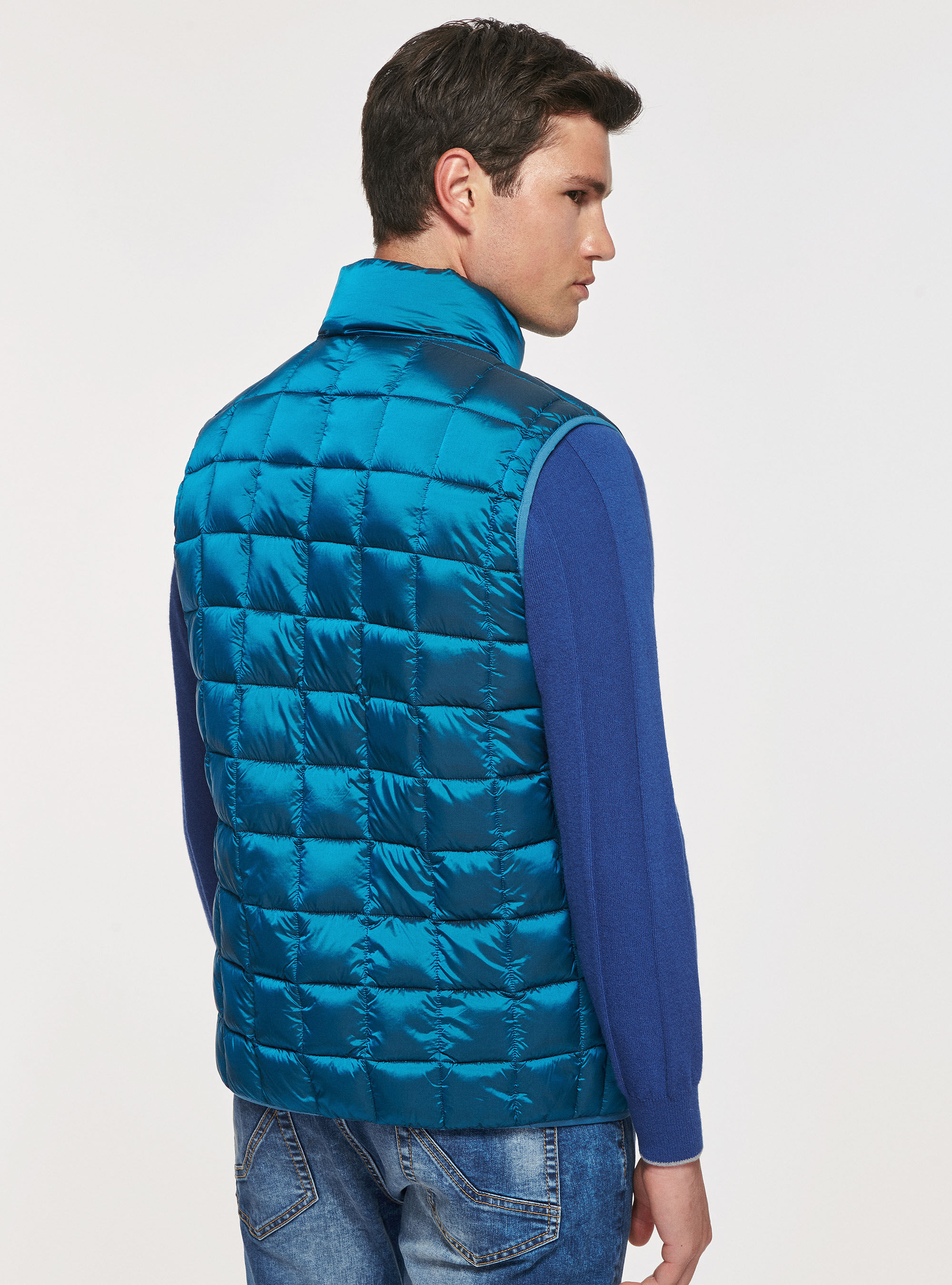 Quilted sleeve with recycled padding, PETROL