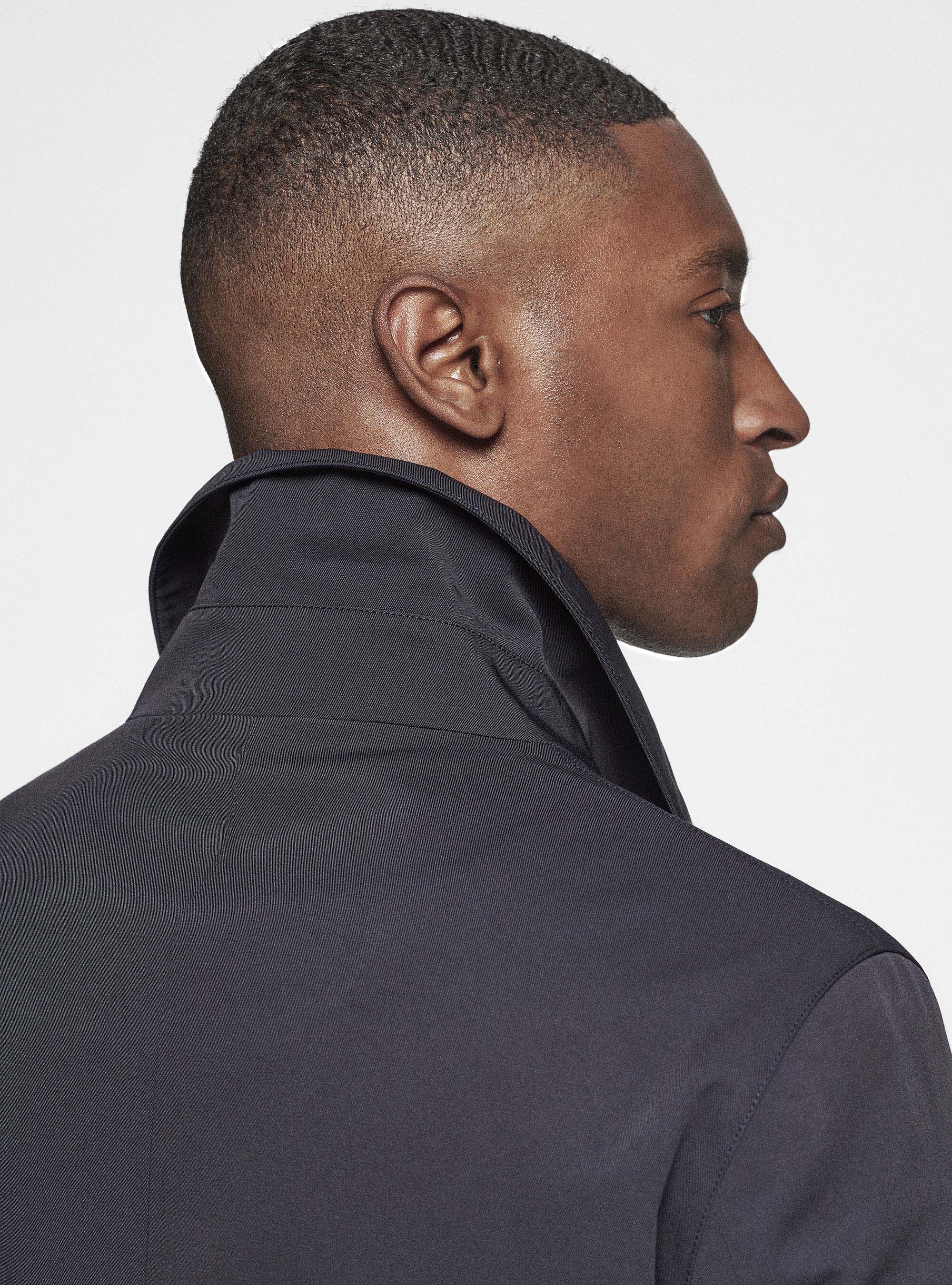 Padded raincoat in technical cotton