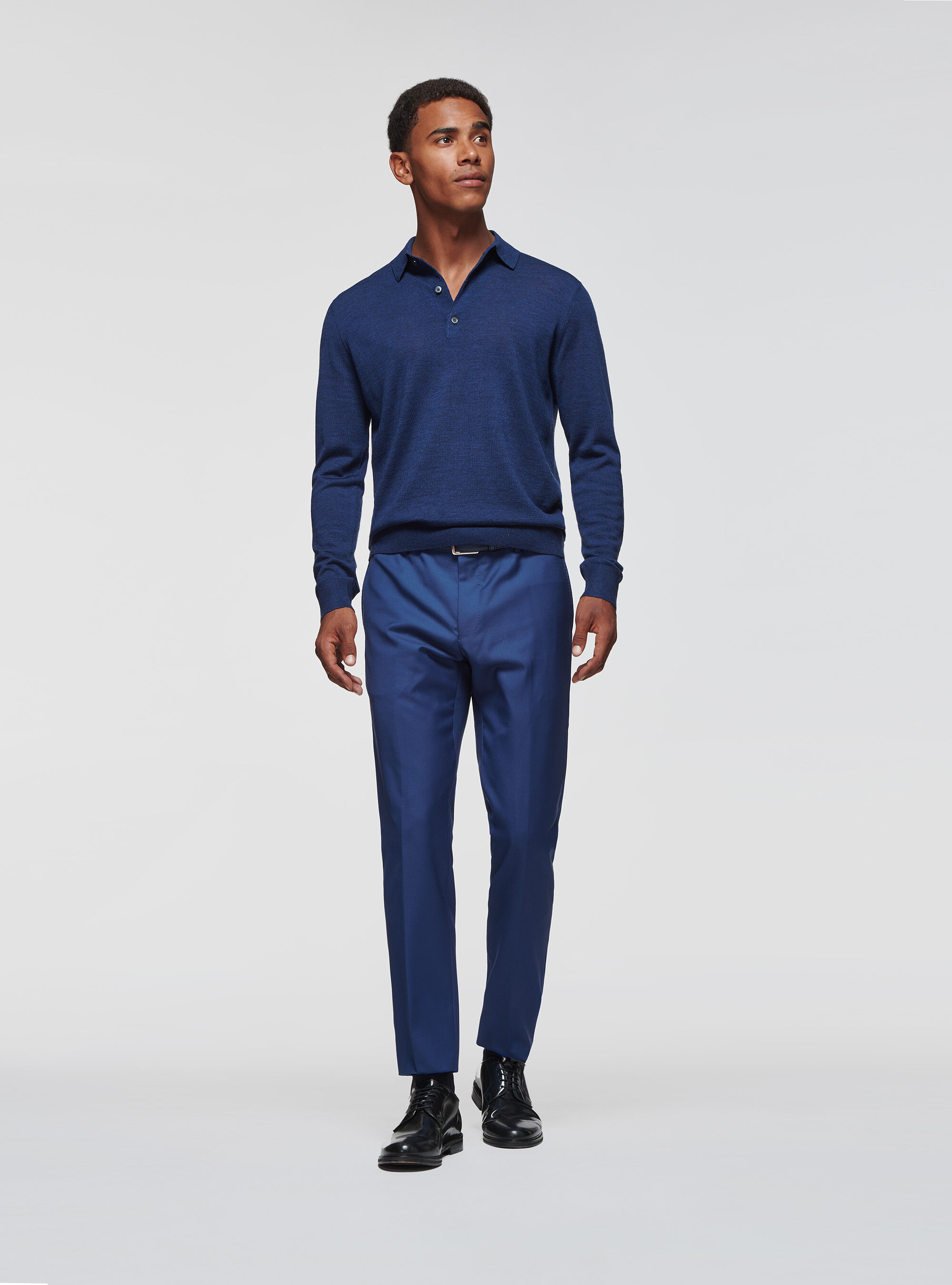 Black pants top blue polo