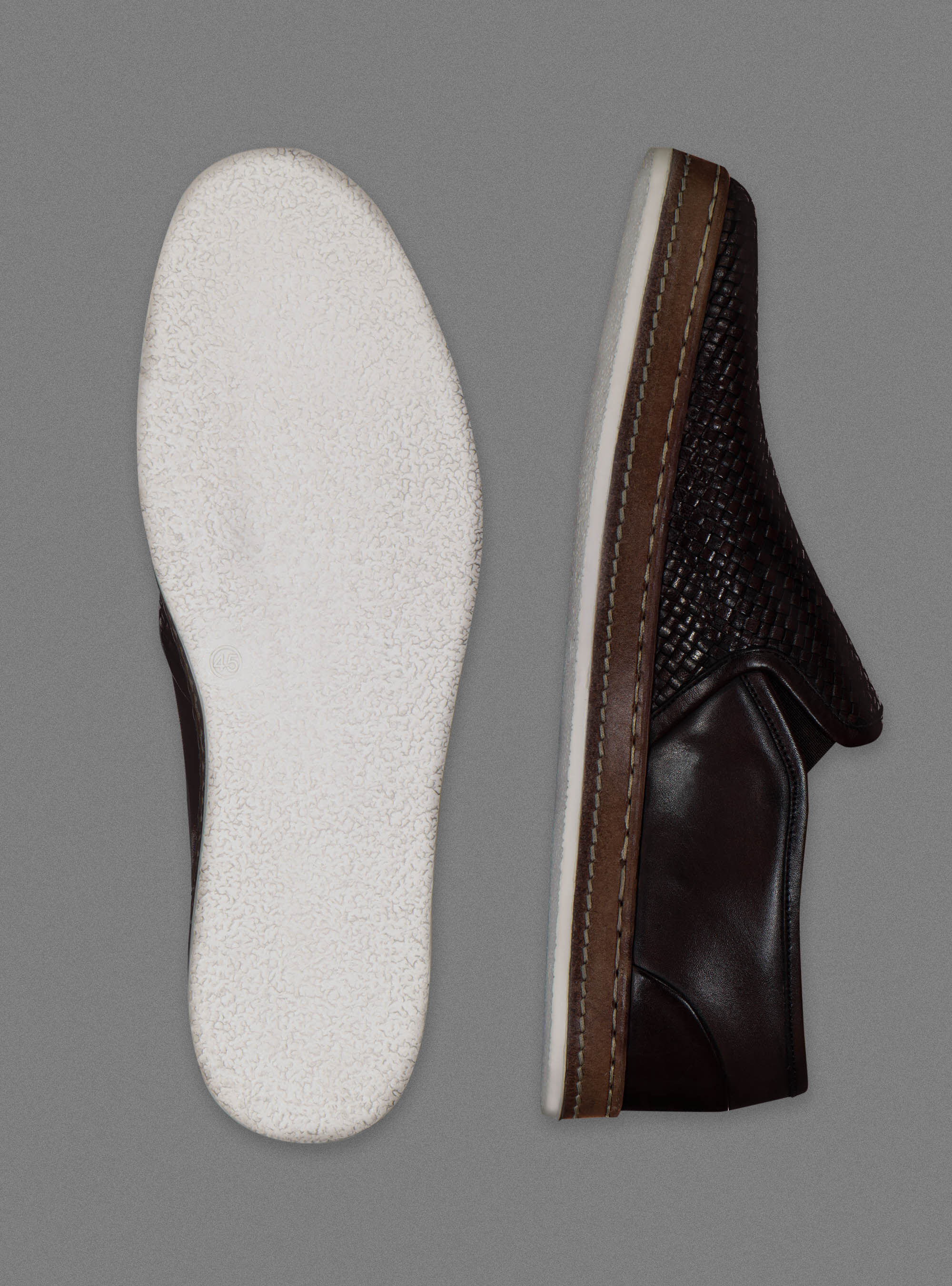 Scarpe slip on in pelle intrecciata
