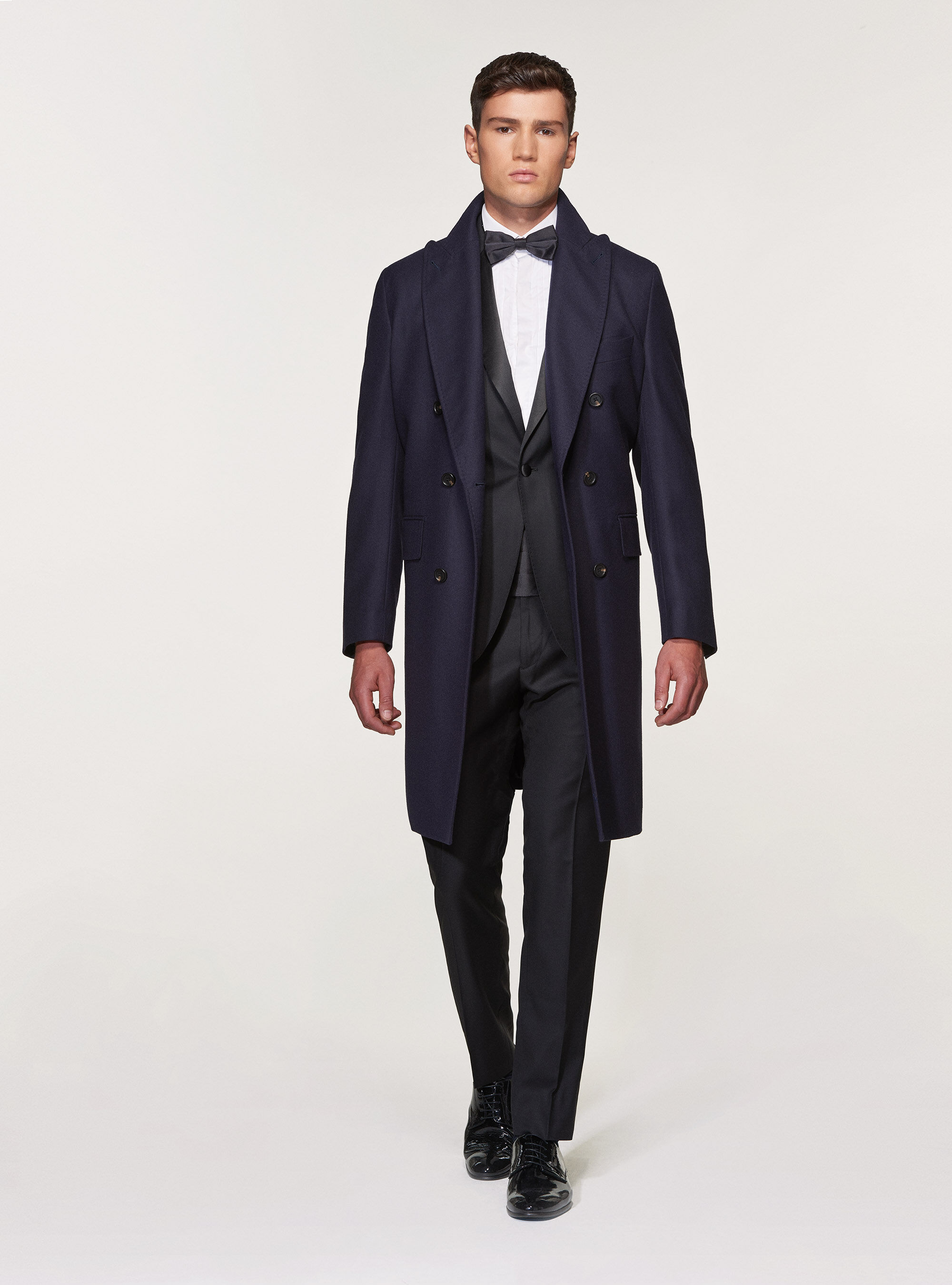 Navy blue double breasted overcoat with belt