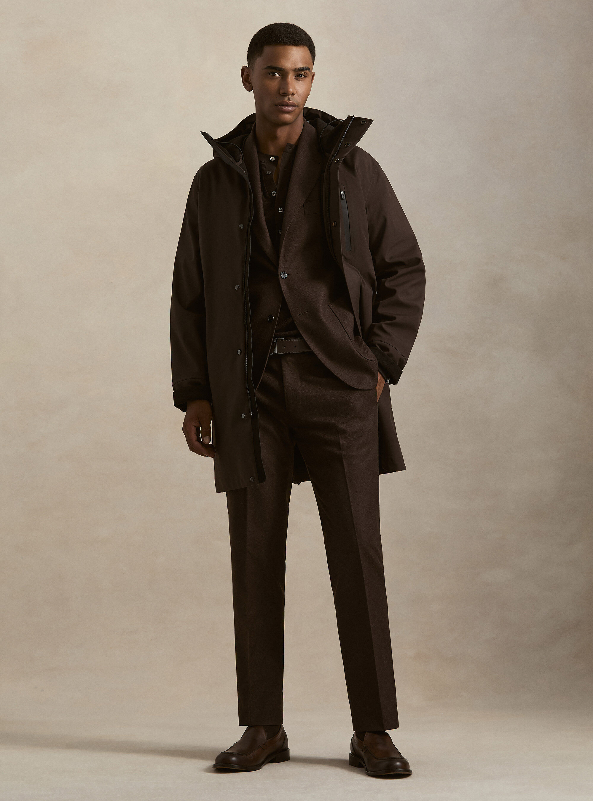 Long technical jacket with a hood