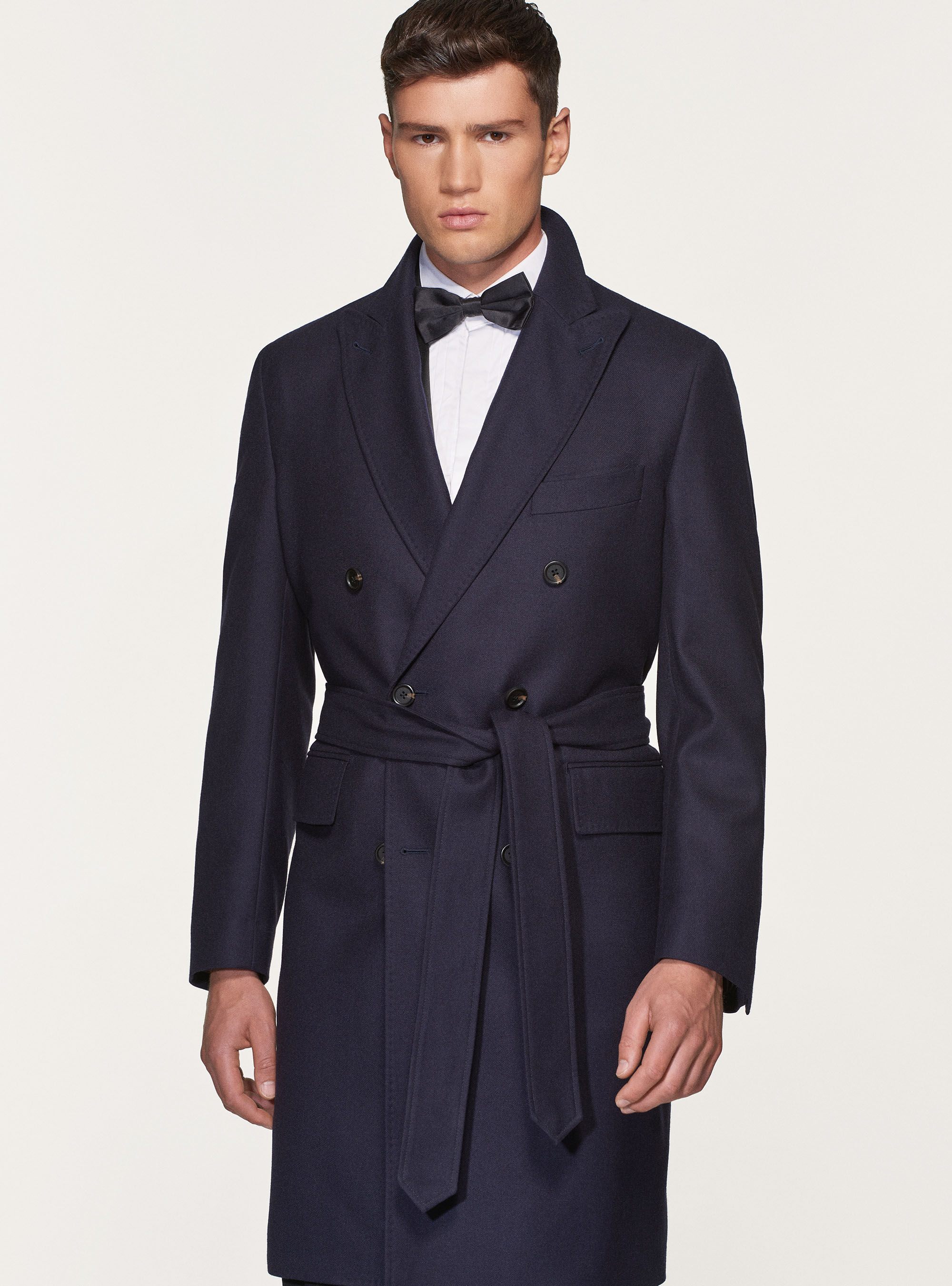 Navy blue double breasted overcoat with belt
