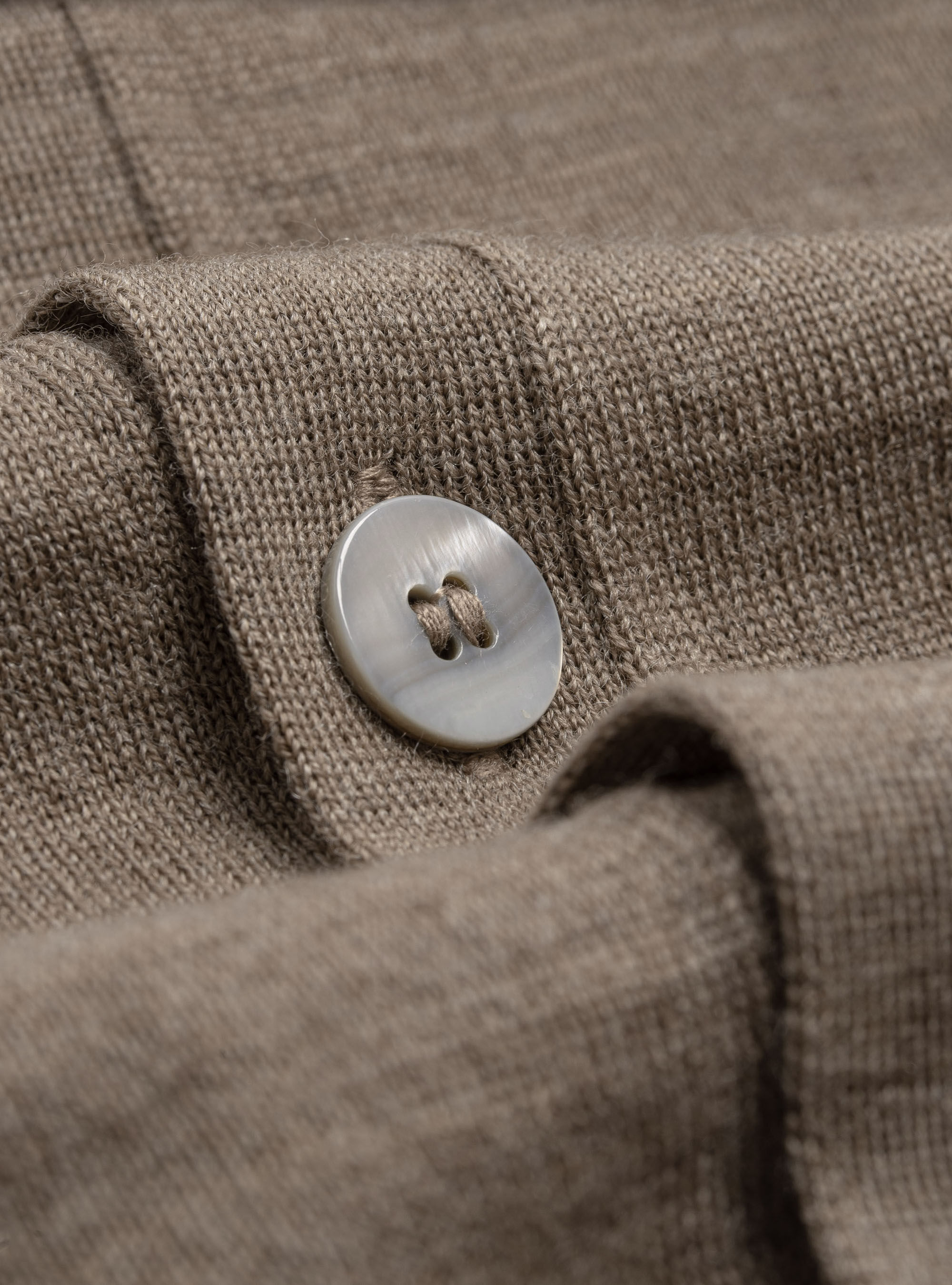 Knitted cardigan in pure merino wool Knitted cardigan in pure merino wool