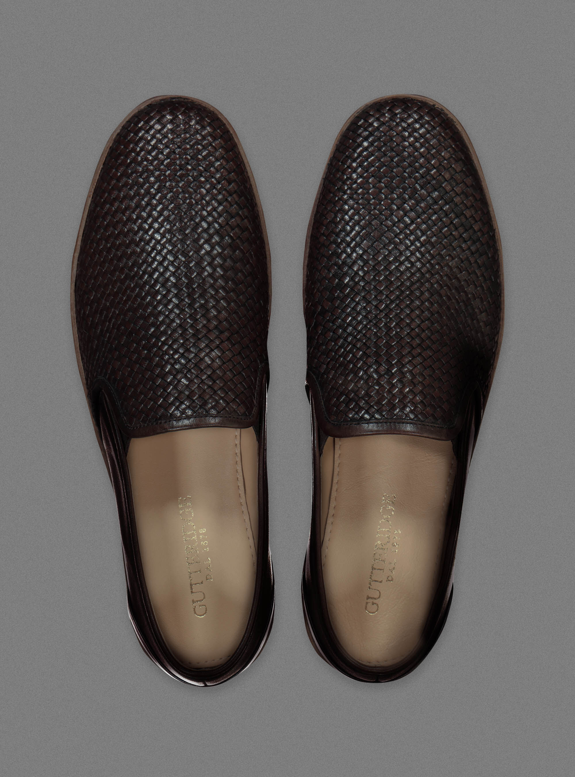 Scarpe slip on in pelle intrecciata