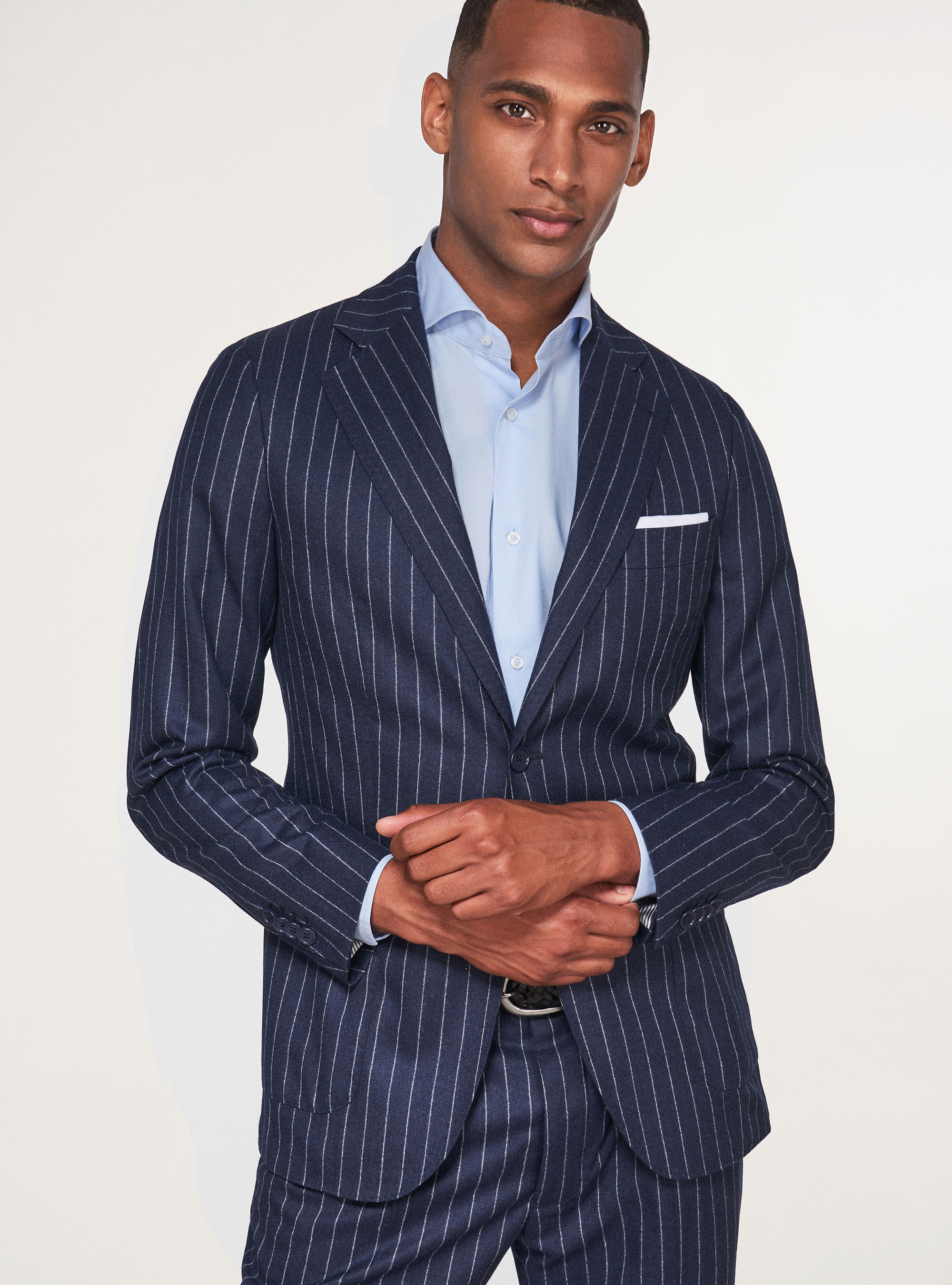 Pinstripe suit jacket with solid pants 2025