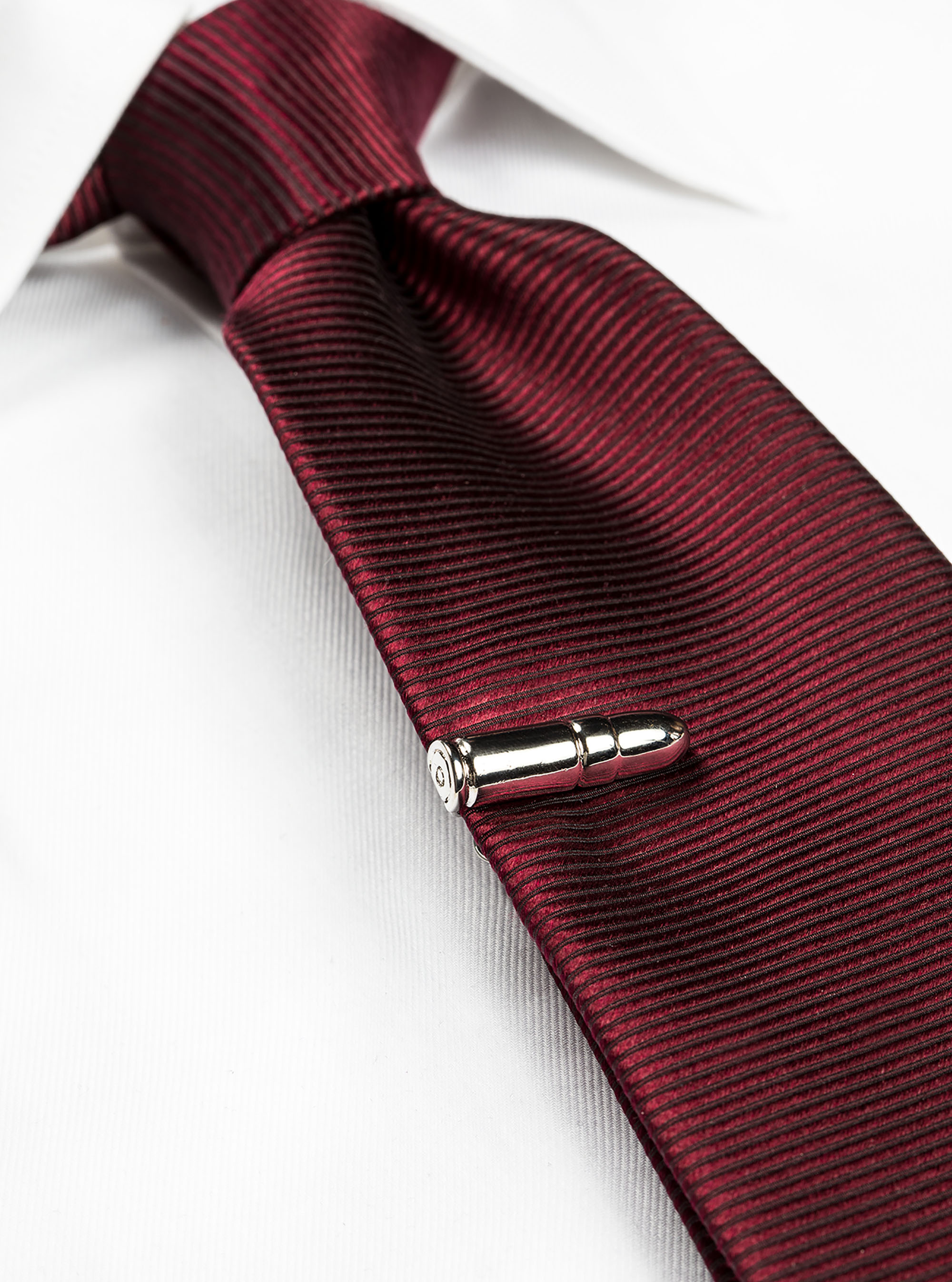 Fermacravatta proiettile, UNICO