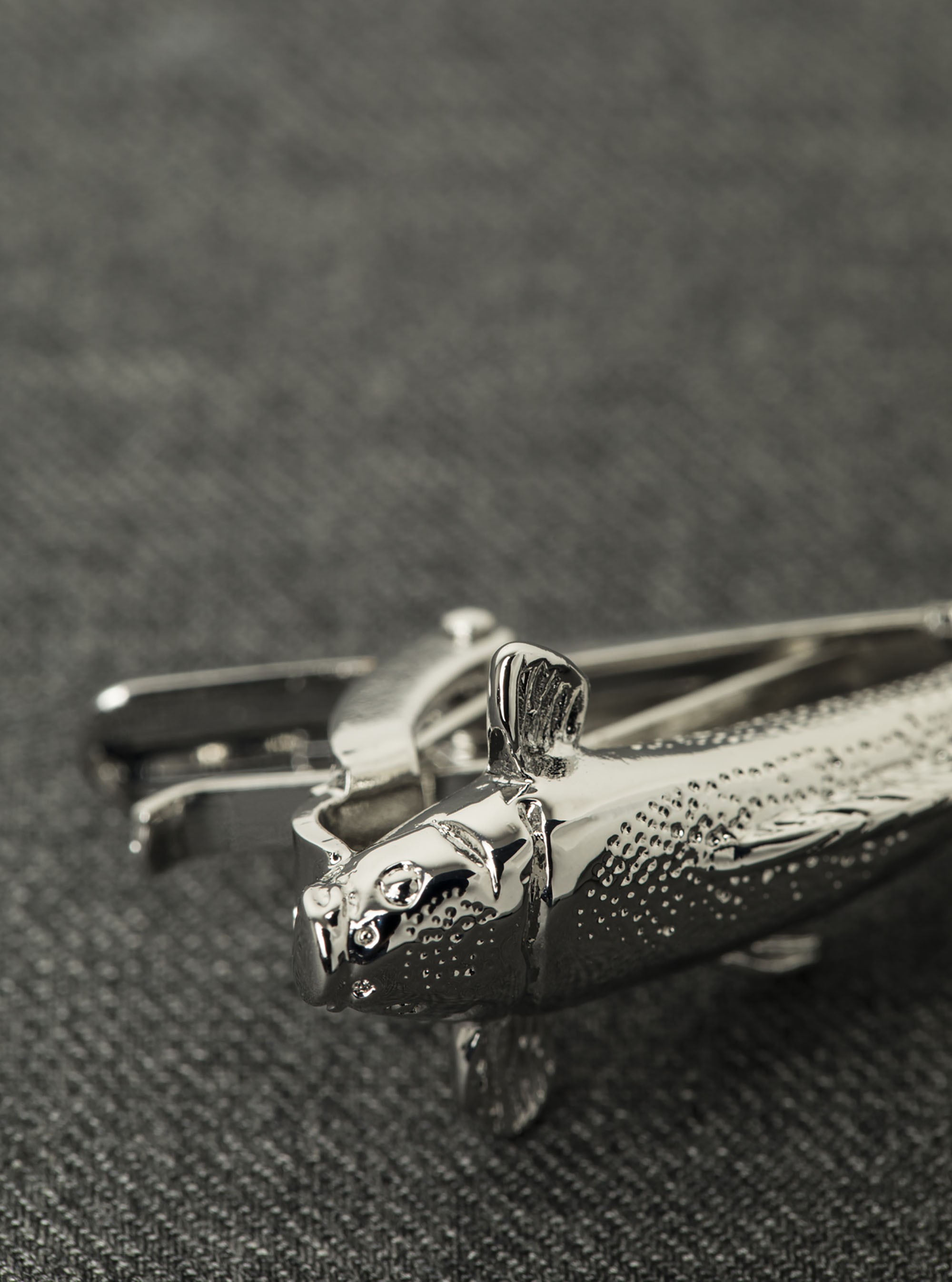 Fermacravatta carpa, UNICO