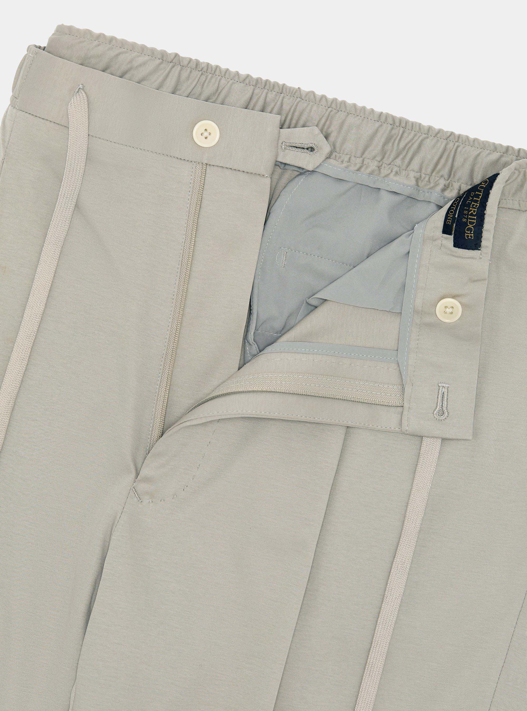 Pantalones con cord&oacute;n ajustable en jersey de algod&oacute;n t&eacute;cnico, CRUDO