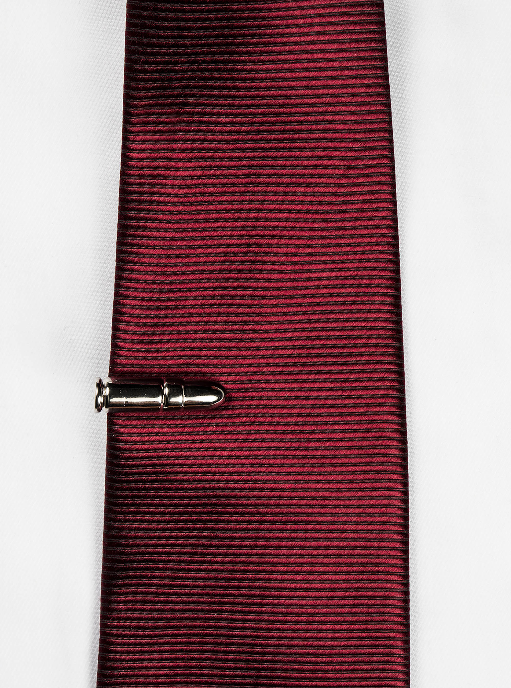 Fermacravatta proiettile, UNICO