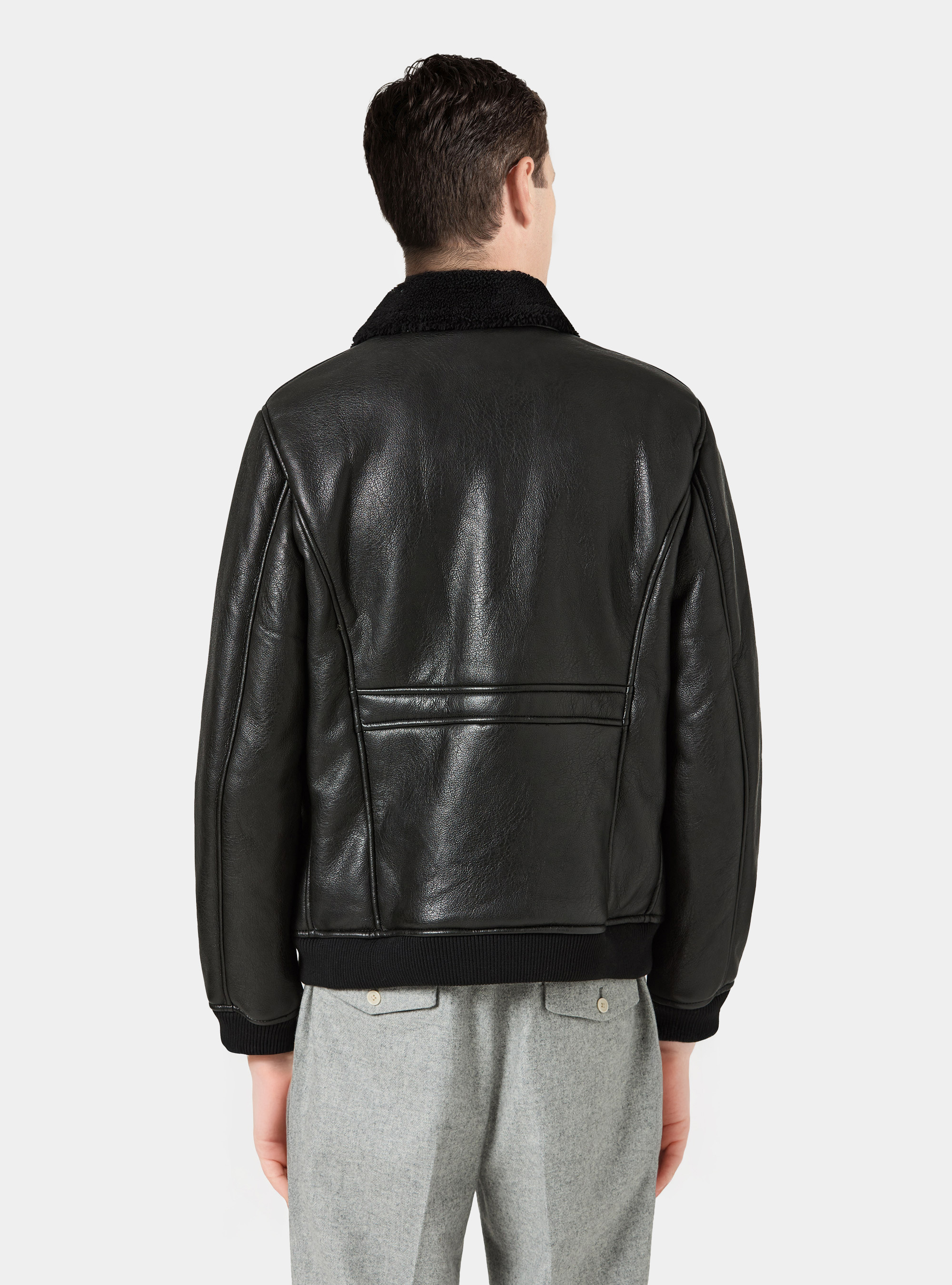 Bomber in similpelle con tasconi, NERO