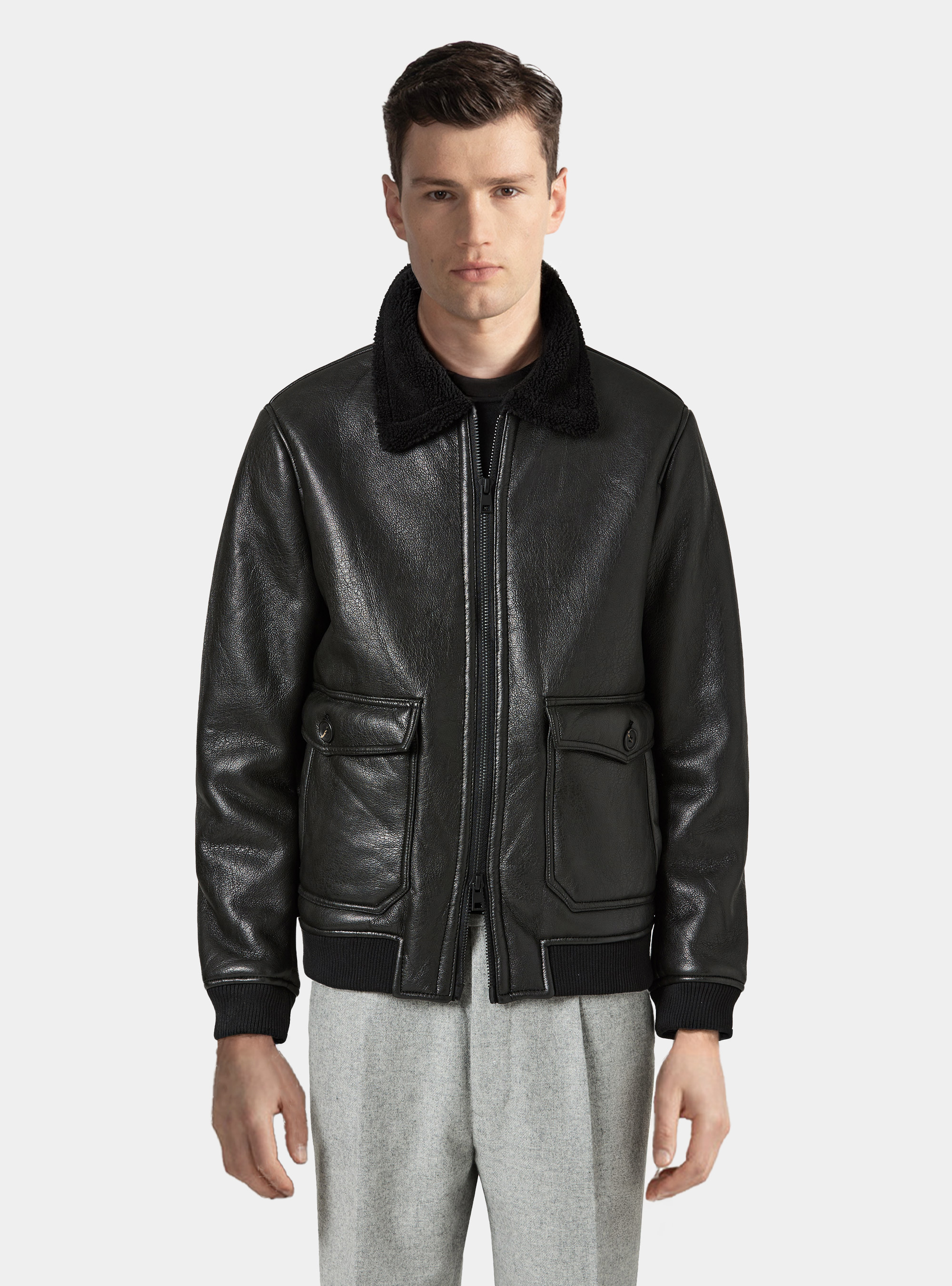 Bomber in similpelle con tasconi, NERO