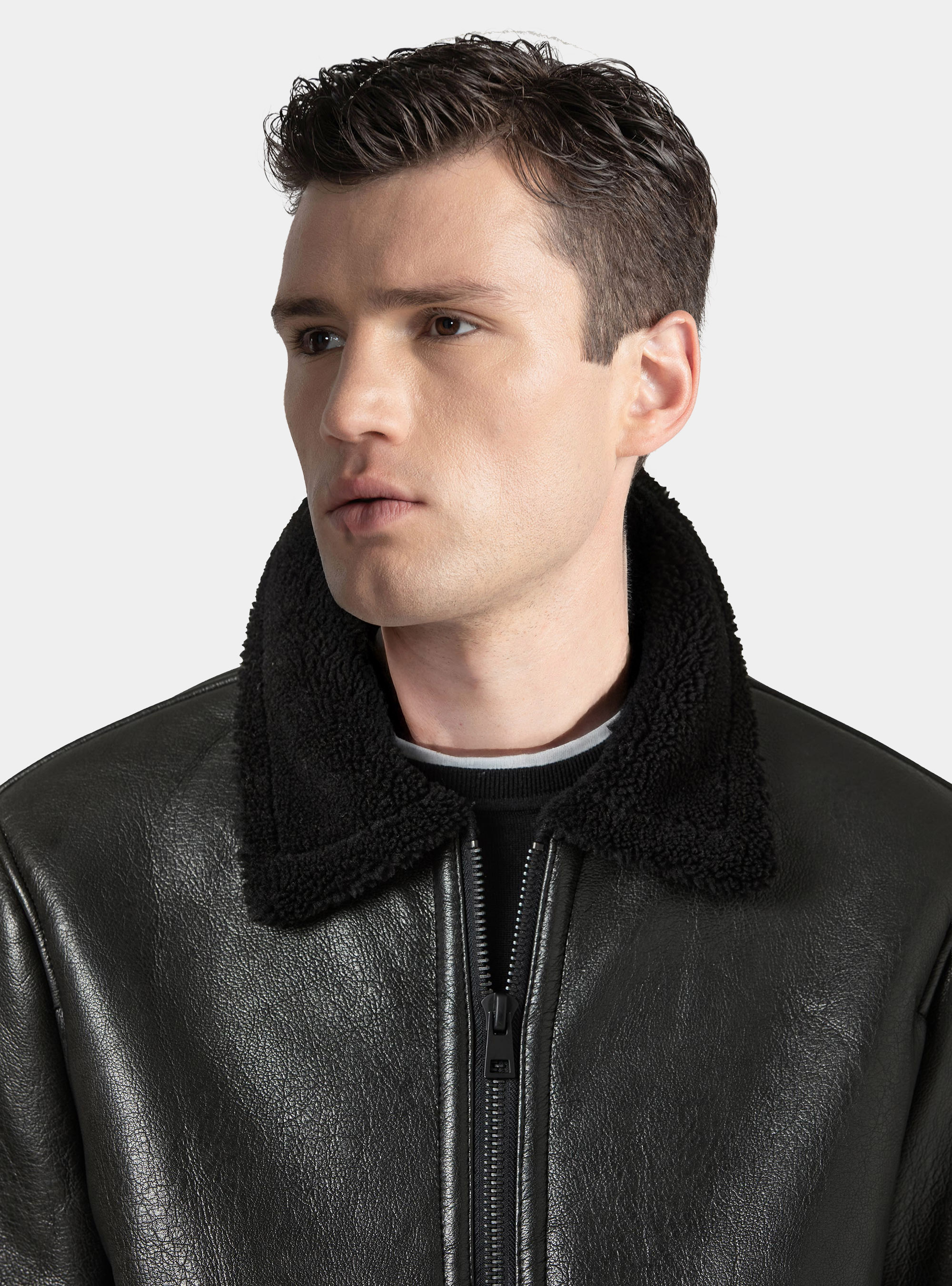 Bomber in similpelle con tasconi, NERO